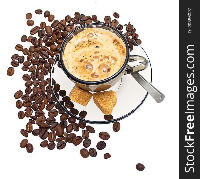 Cappuccinot, brown sugar and coffee beans on white background