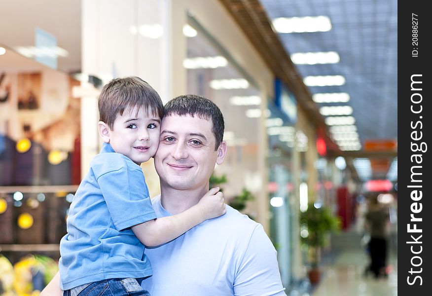 Dad and the son in shopping center. Dad and the son in shopping center