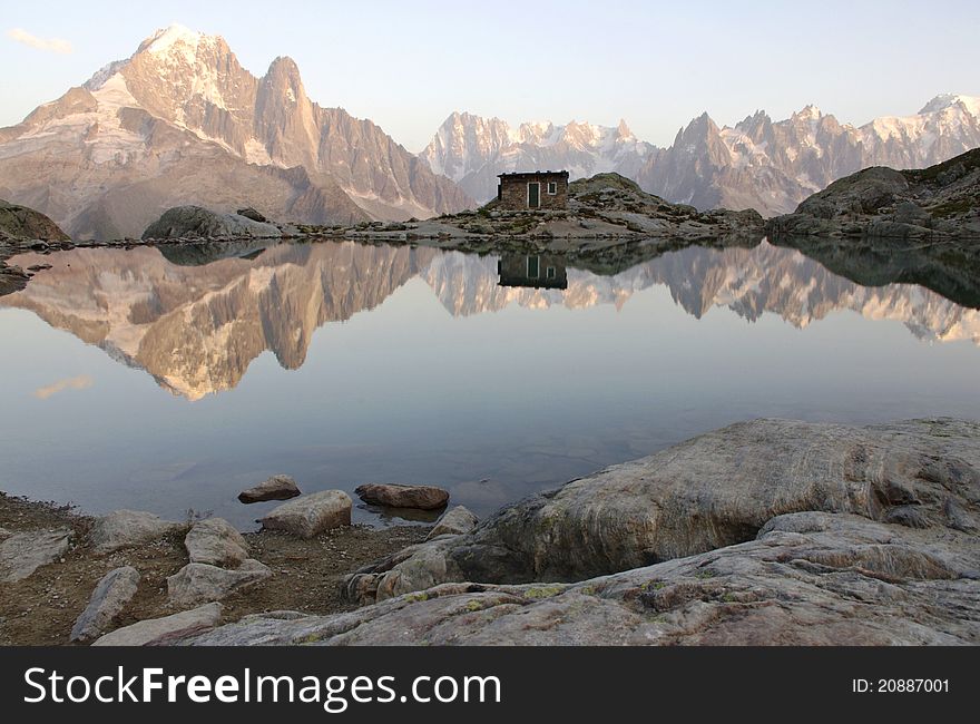 Reflection of alpine mountains in lac blanc in France. Reflection of alpine mountains in lac blanc in France