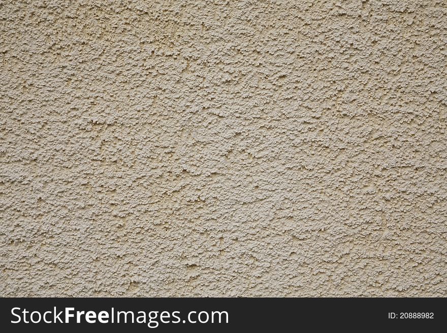 Texture of beige wall plastering. Texture of beige wall plastering