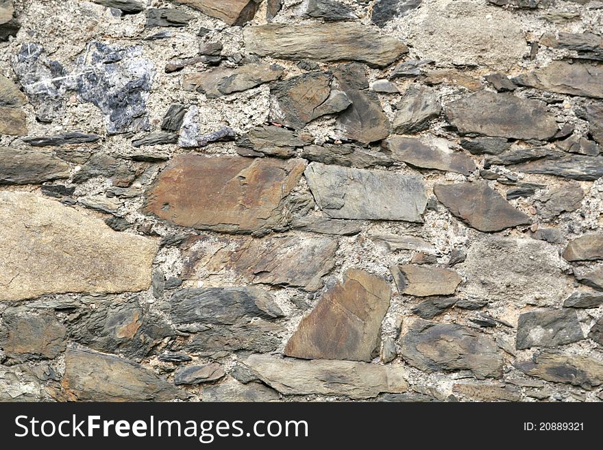 Closeup of stone wall use for construction business and designers (Textures)