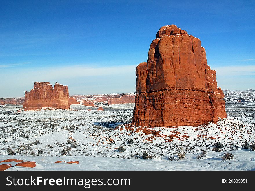 Arches National Park, UT - December 9, 2011 - Sandstone monoliths in winter with snow.