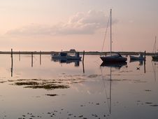 Sail Boats Reflected In The Ocean Stock Photos Sail Boats Reflected In The Ocean Stock Photos
