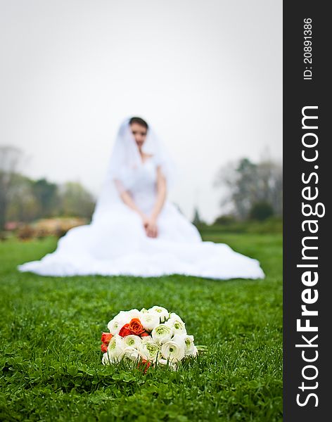 Isolated Bride's cluster bouquet on grass