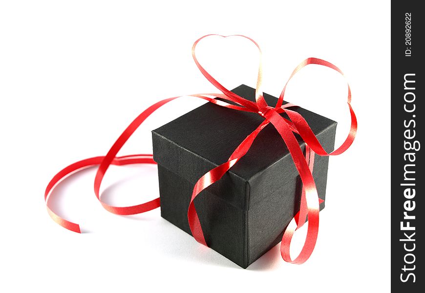 Black gift box with red bow. Black gift box with red bow
