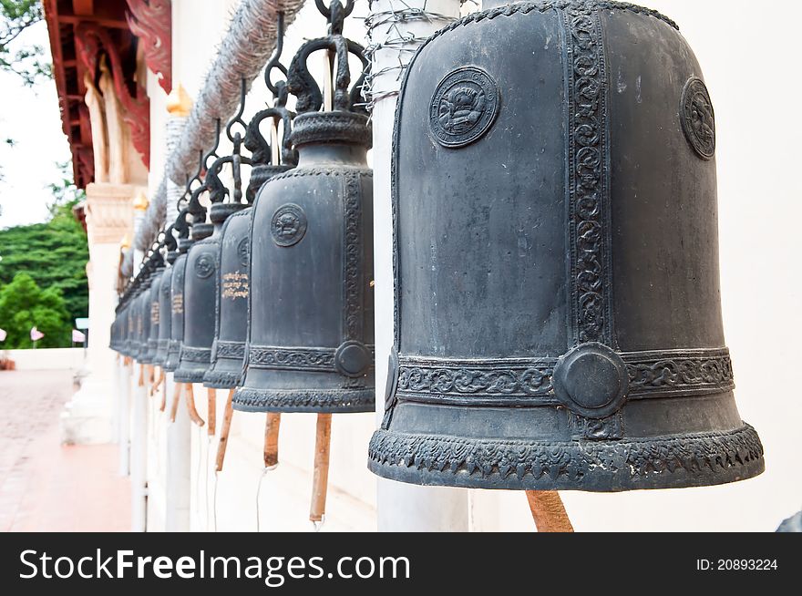 Many black bell outside the temple in Thailand.