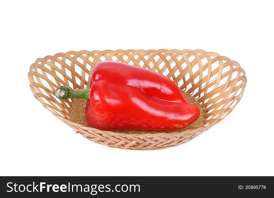 Fresh red hot pepper on a white