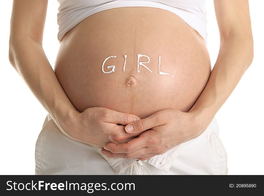 Stomachs of pregnant woman with the inscription girl isolated on white. Stomachs of pregnant woman with the inscription girl isolated on white