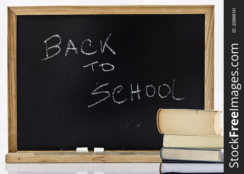 Back to school on blackboard inwhite background