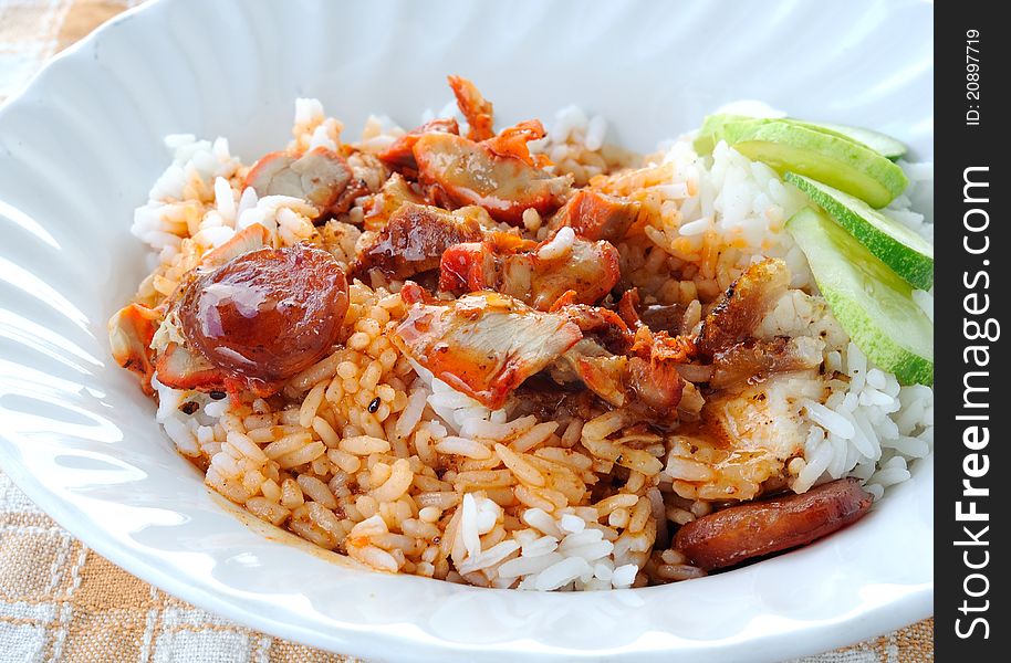 Barbuced red pork in sauce with rice in thai style