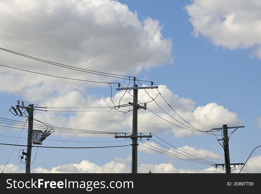 Highly charged electrical power lines with sky background. Highly charged electrical power lines with sky background.