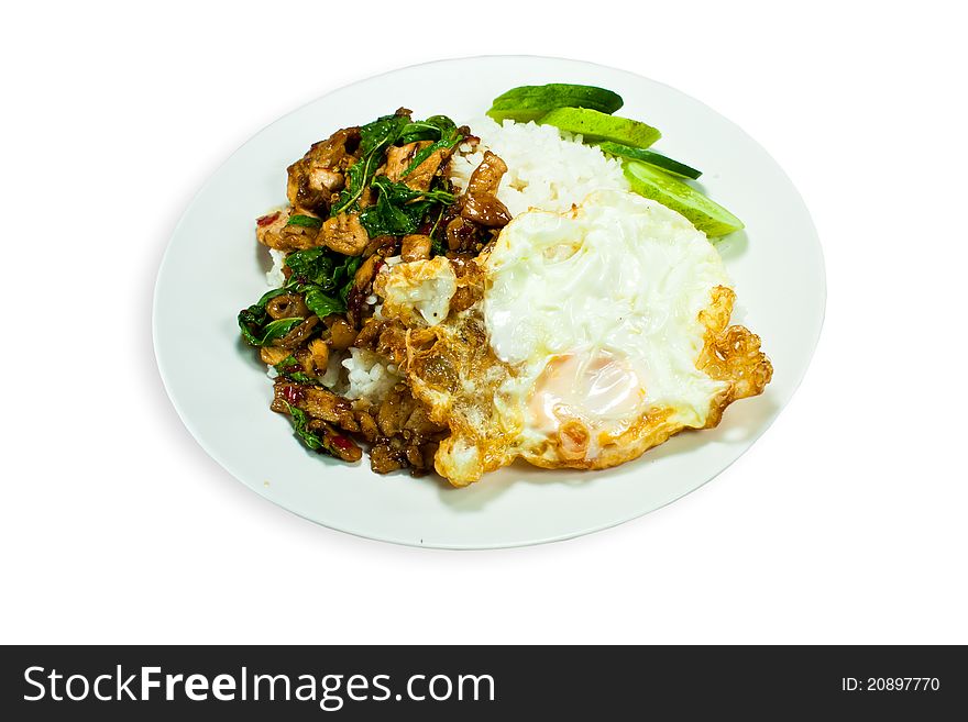 Stir fried Chicken with basil and egg served with rice. Stir fried Chicken with basil and egg served with rice