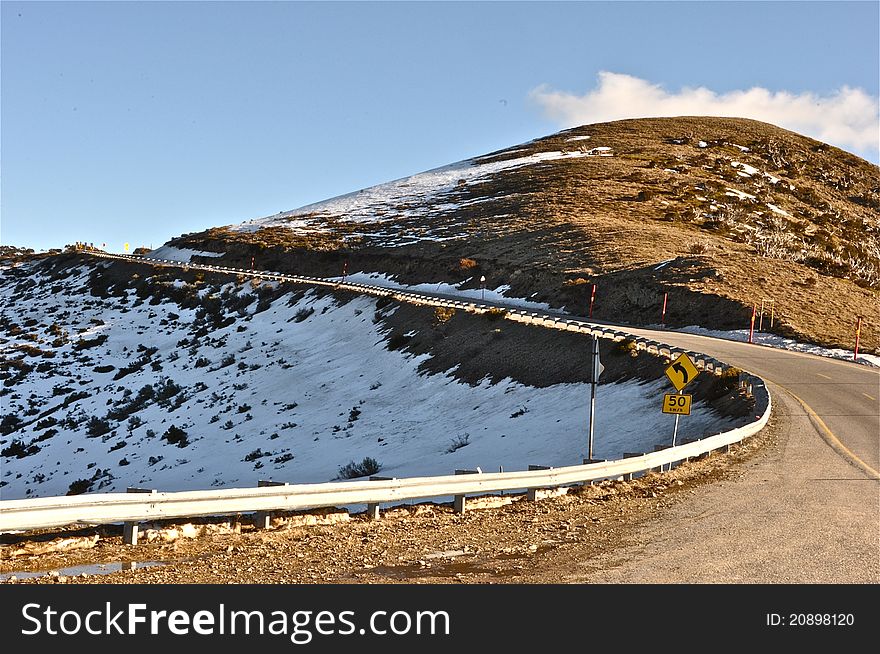 Part of great alpine road leading up to Mount Hotham in late winter