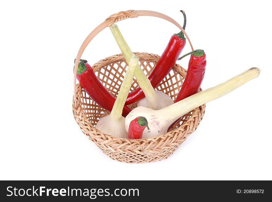 Fresh red hot pepper on a white