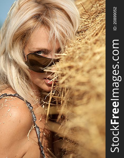 Woman  in hay stack