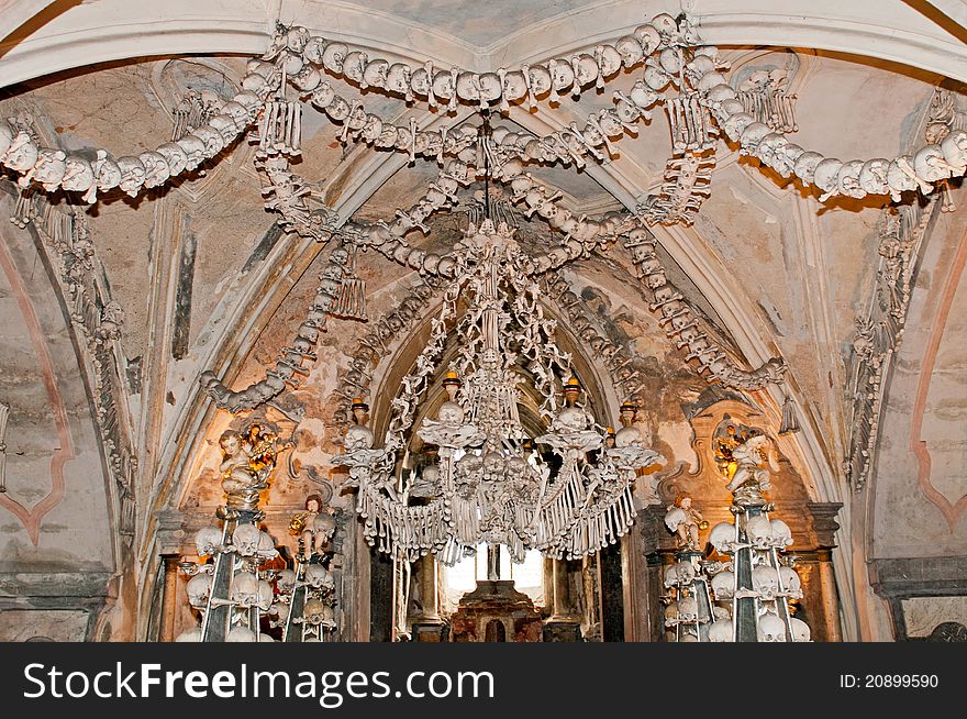 A chandelier constructed by bones, skulls and jaws in Sedlec Ossuary monastry, Kutna Hora, Czech Republic.