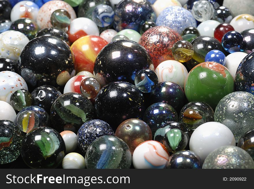 Different glass-balls in all sizes, suitable as backgrounds and designs, with diminishing perspective. Different glass-balls in all sizes, suitable as backgrounds and designs, with diminishing perspective