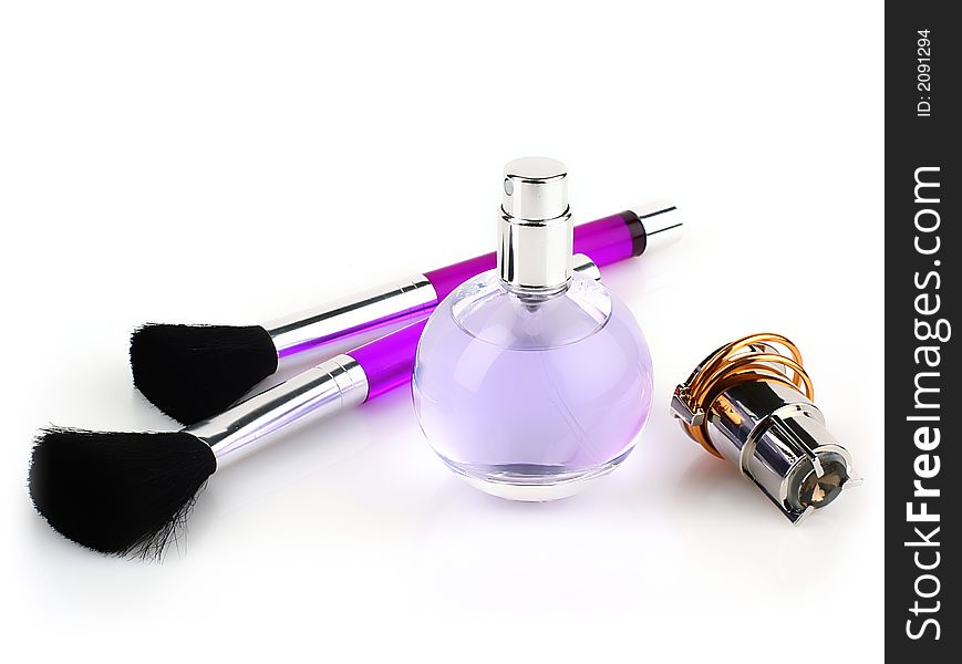 Vial spirit and tassels on white background