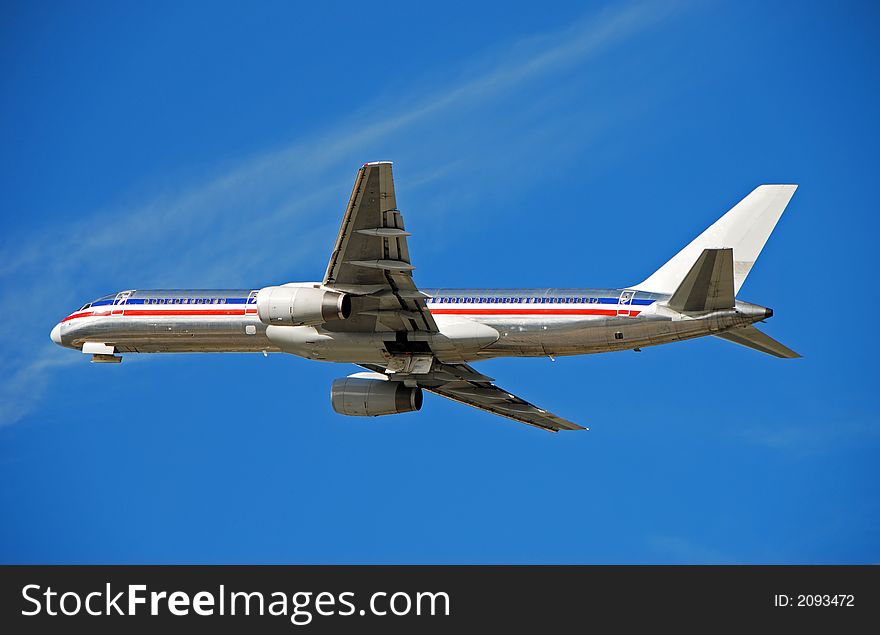 Silver Boeing jet airplane in flight