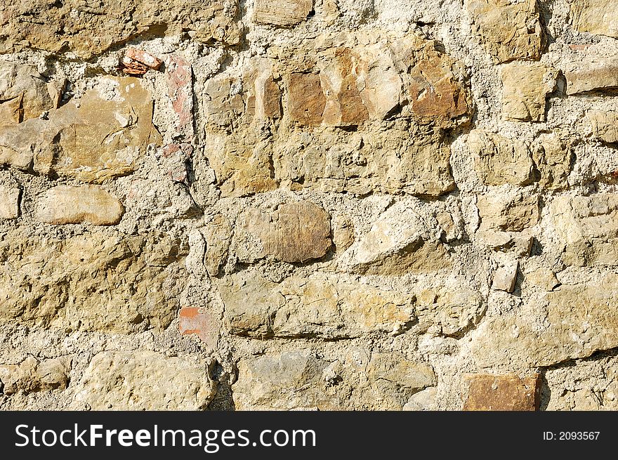 A wall made of stone. A wall made of stone