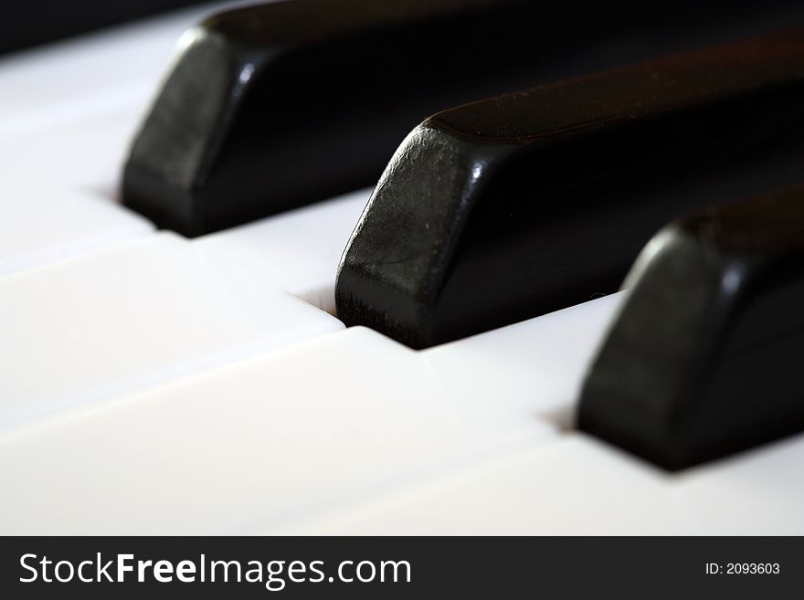 A keyboard of a piano