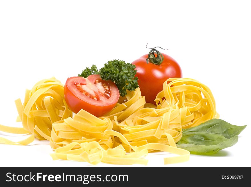 Tagliatelle and other ingredients for an Italian meal