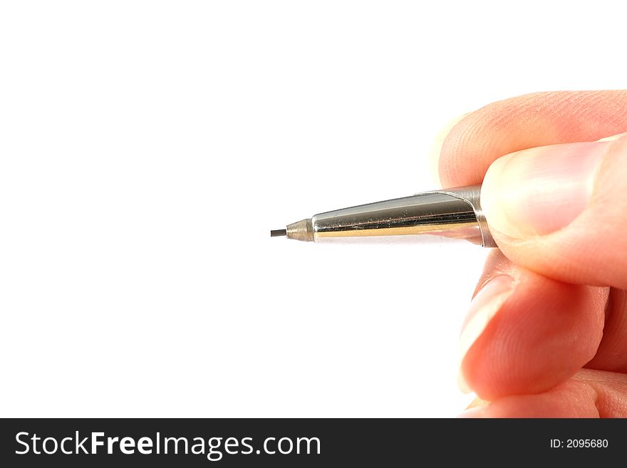 Hand holding a pencil, just about to write