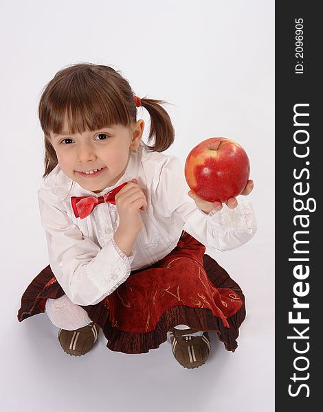 Picture of little smiling girl with big apple. Picture of little smiling girl with big apple