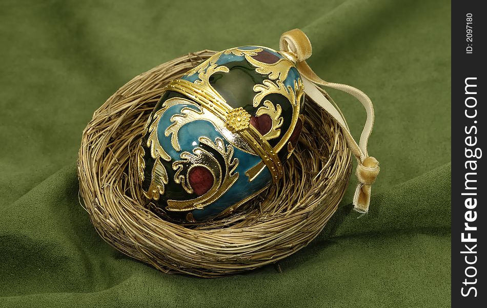 Photo of a Decorative Egg in a Nest - Faberge Egg