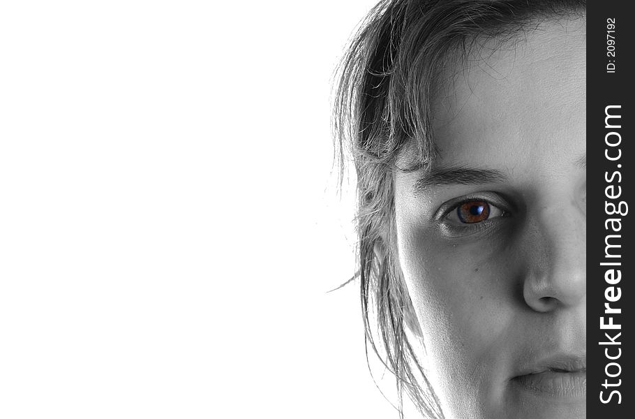 This picture shows a young natural woman. The picture has been desaturated except her eye that shines brown and green. Ideal for business solutions. This picture shows a young natural woman. The picture has been desaturated except her eye that shines brown and green. Ideal for business solutions.