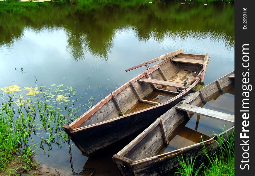 Boats of the fisherman near by riverside Nemunas in Lithuania