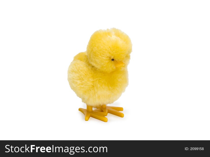 Little yellow baby chick toy isolated over white background