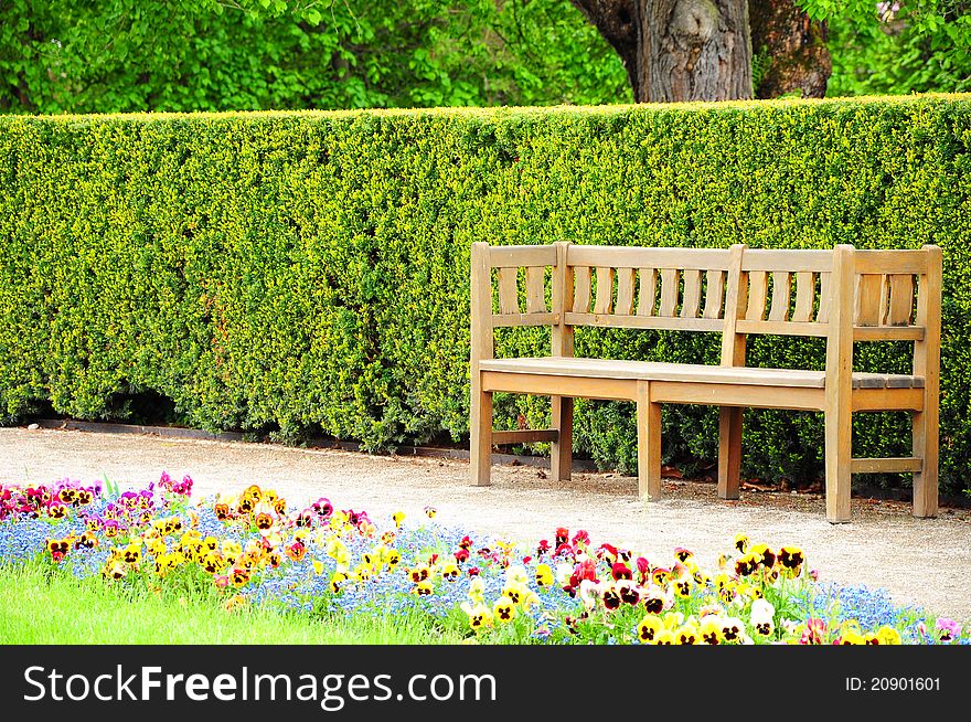 Wooden bench in the garden of Cesky Krumlov palace