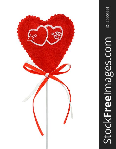 Valentines red heart on a stick with red and white ribbons, isolated. Valentines red heart on a stick with red and white ribbons, isolated