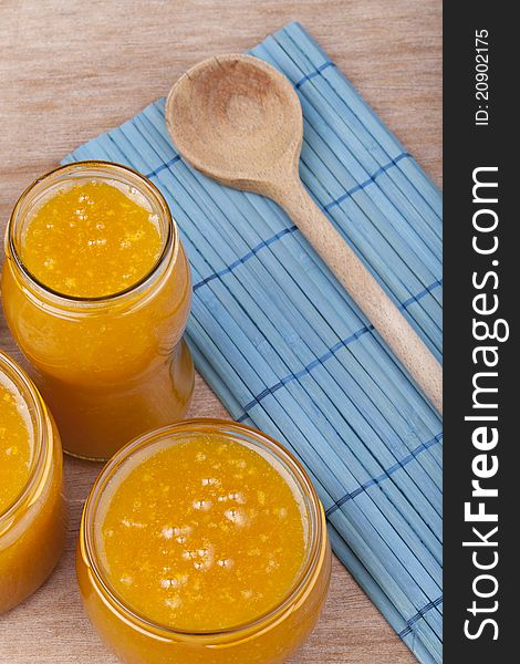 Studio-shot of homemade small yellow plum ( mellow mirabelle ) jam in a glass jar. Studio-shot of homemade small yellow plum ( mellow mirabelle ) jam in a glass jar.