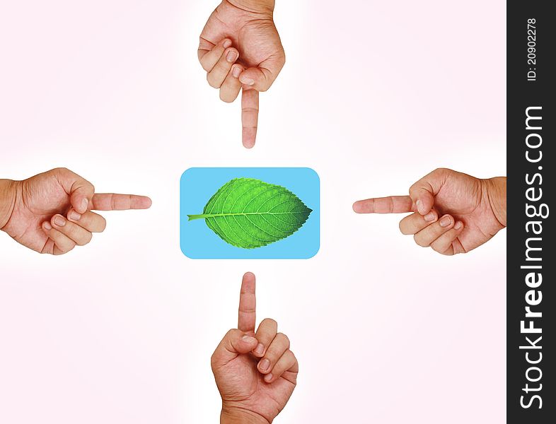 Hand pointing on green leaf button on light background