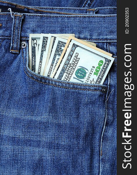 Dollars banknote in blue jeans pocket. Dollars banknote in blue jeans pocket