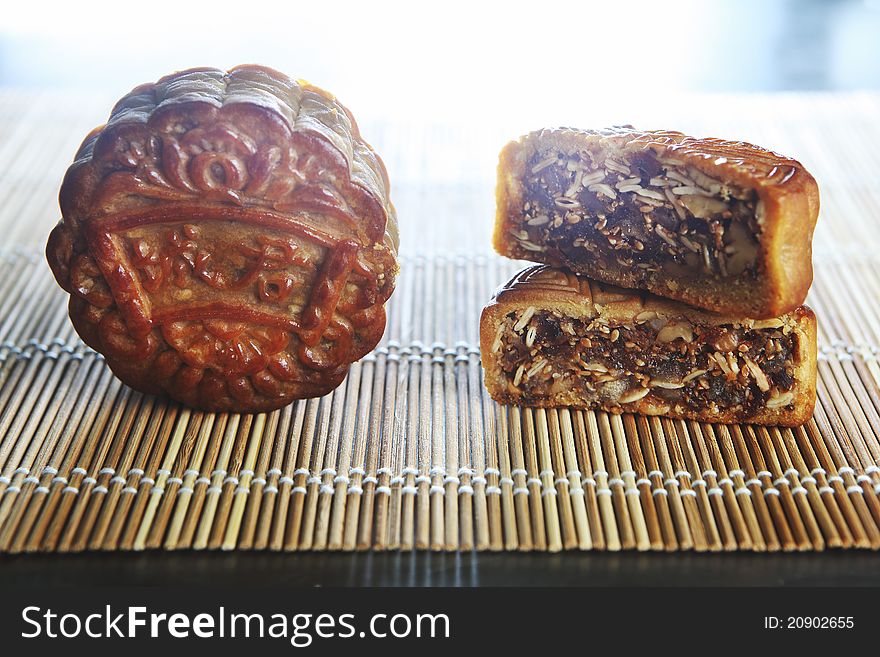 Chinese cake, moon cake with nuts inside.
