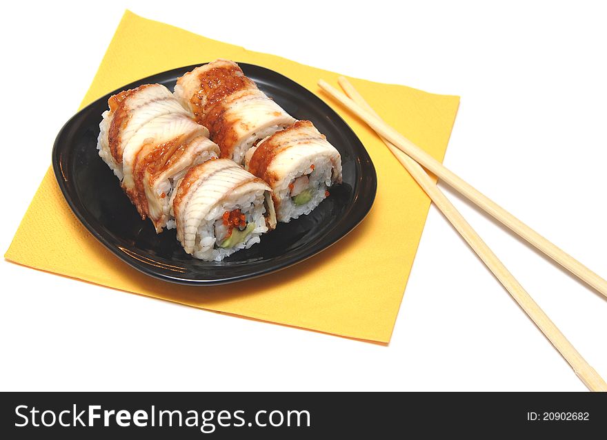 Seafood. Traditional sushi and rolls on the dish. Seafood. Traditional sushi and rolls on the dish