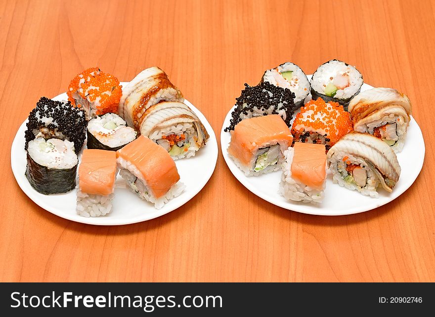 Seafood. Traditional sushi and rolls on the dish