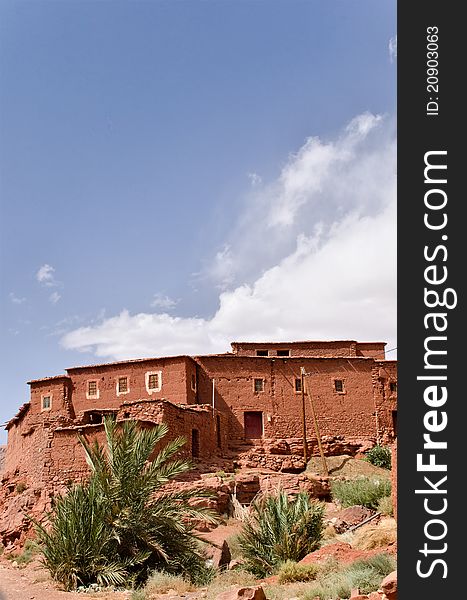 Red houses on the High Atlas Mountains in Morocco. Red houses on the High Atlas Mountains in Morocco.