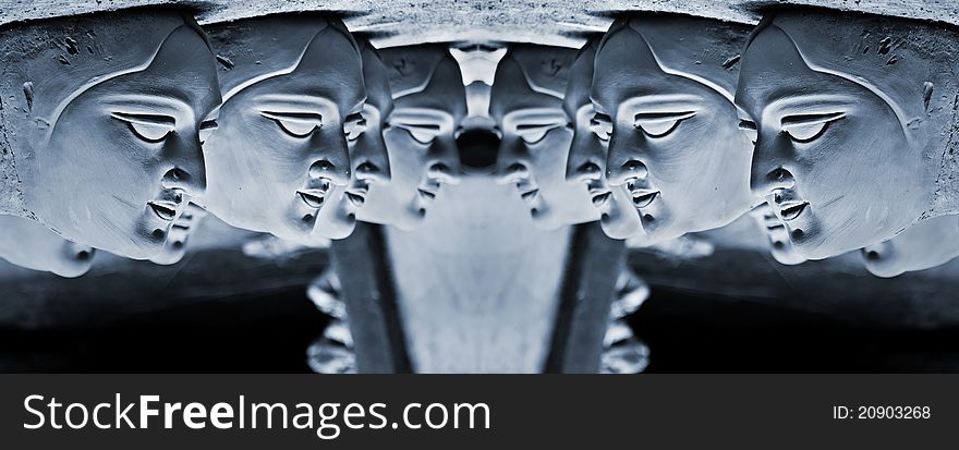 Group of clay heads of godesses facing each other. Group of clay heads of godesses facing each other