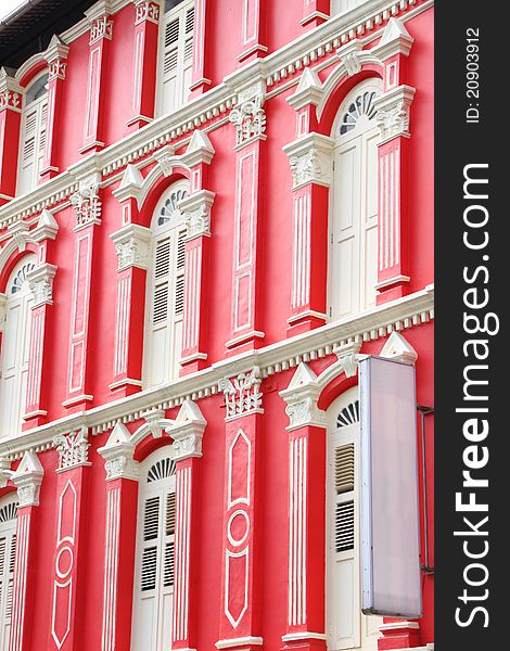 Red Building And White Windows