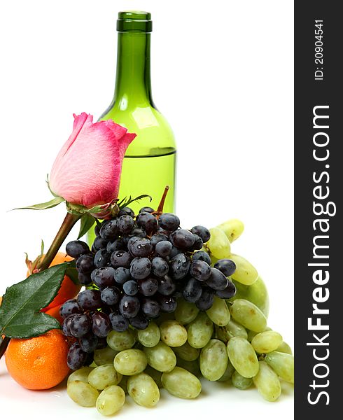 Wine and grapes on a white background