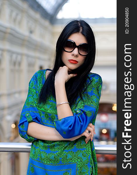 Fashionable portrait of a beautiful model posing indoor