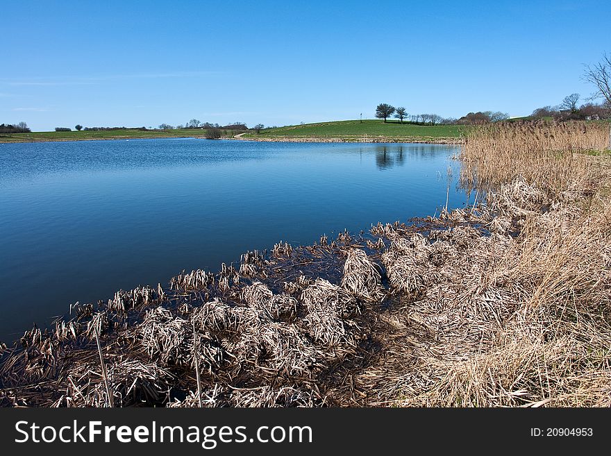 Beautiful blue water lake landscape in the summer. Beautiful blue water lake landscape in the summer