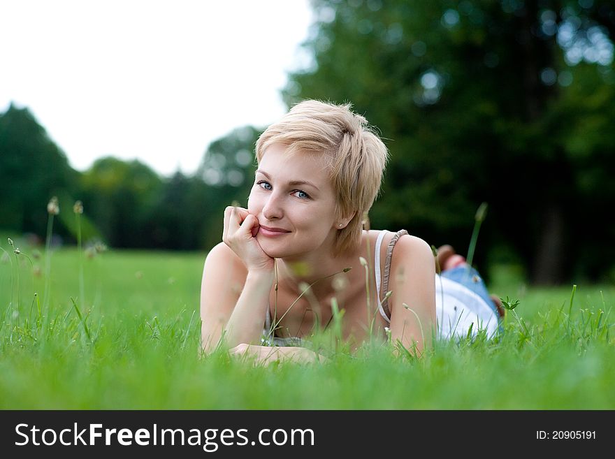 Young Woman On Green Field