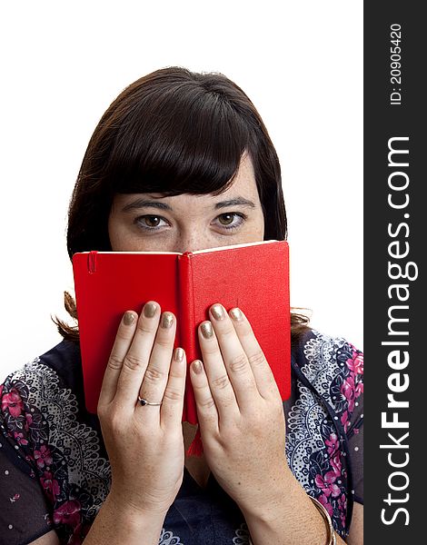 A young woman reading a book. A young woman reading a book