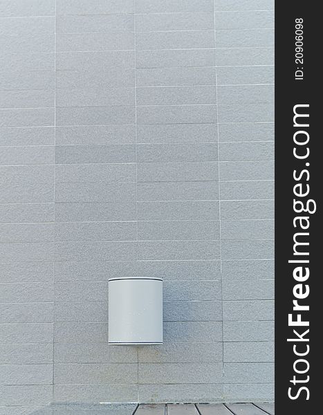 Electric lamp with gray stone wall background