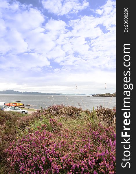 Car and kayak with scenic view